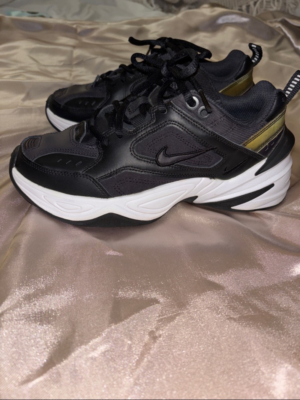 Nike Black and White Sneakers with Olive Heel Accent